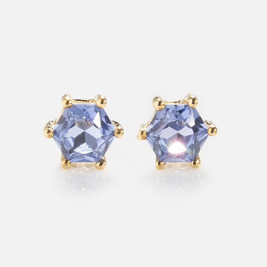 Solid Gold Modern Birthstone Studs: hexagon-shaped blue gemstone studs with yellow gold prong settings, shown on a white background.