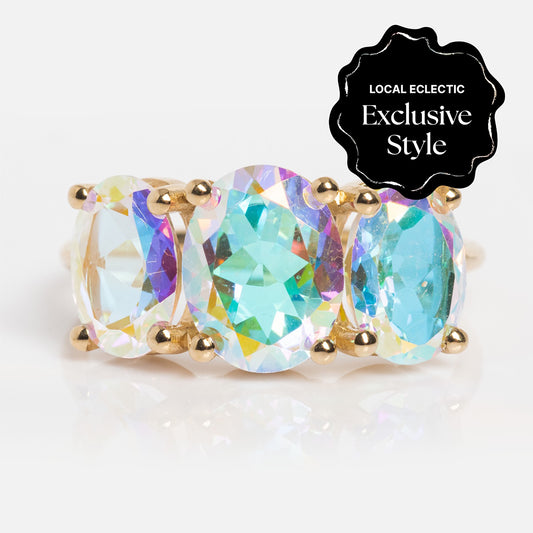 The One of a Kind 14k Angel Aura Gumdrop Ring features three large, oval, iridescent gemstones with rainbow hues. A Local Eclectic Exclusive Style, this unique piece is truly one of a kind.
