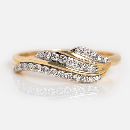 The 14k Solid Gold Josephine Diamond Crown Ring features three overlapping, wave-like bands adorned with sparkling diamonds and shines beautifully against a white background.