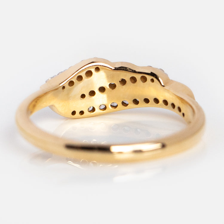 The 14k Solid Gold Josephine Diamond Crown Ring features a wavy, elevated design with multiple small holes on the underside, shown against a white background.