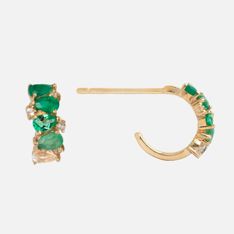 Solid Gold Ombre Birthstone Huggie Hoops in 9k gold, set with green and clear gemstones, displayed from the side and front against a plain white background.