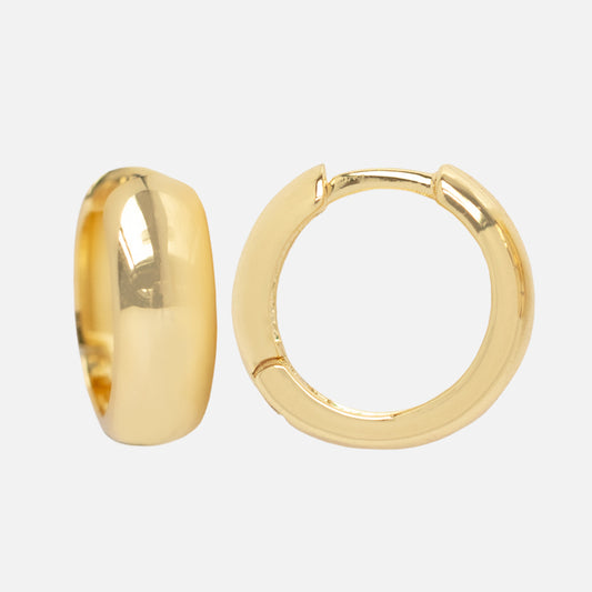 Two Chunky Huggie Hoops are displayed on a white background—one stands upright to highlight its thickness, while the other lies flat to show its circular design and stackable clasp.