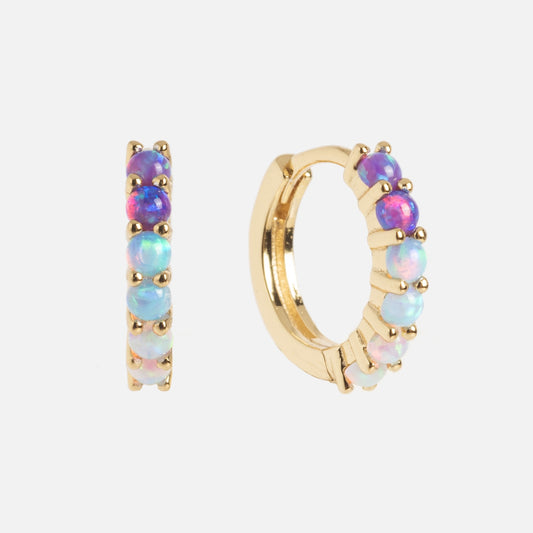 Mini Opal Ombre Huggies in 18k yellow gold vermeil, featuring a row of blue, purple, and pink opals set along the outer edge, displayed on a plain white background.