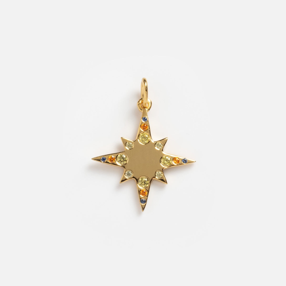 The Solid Gold Celestial Star Charm Sample is an eight-pointed star pendant with yellow, blue, and orange gemstones, featuring a circular loop for attaching to a necklace or bracelet, shown on a plain white background.