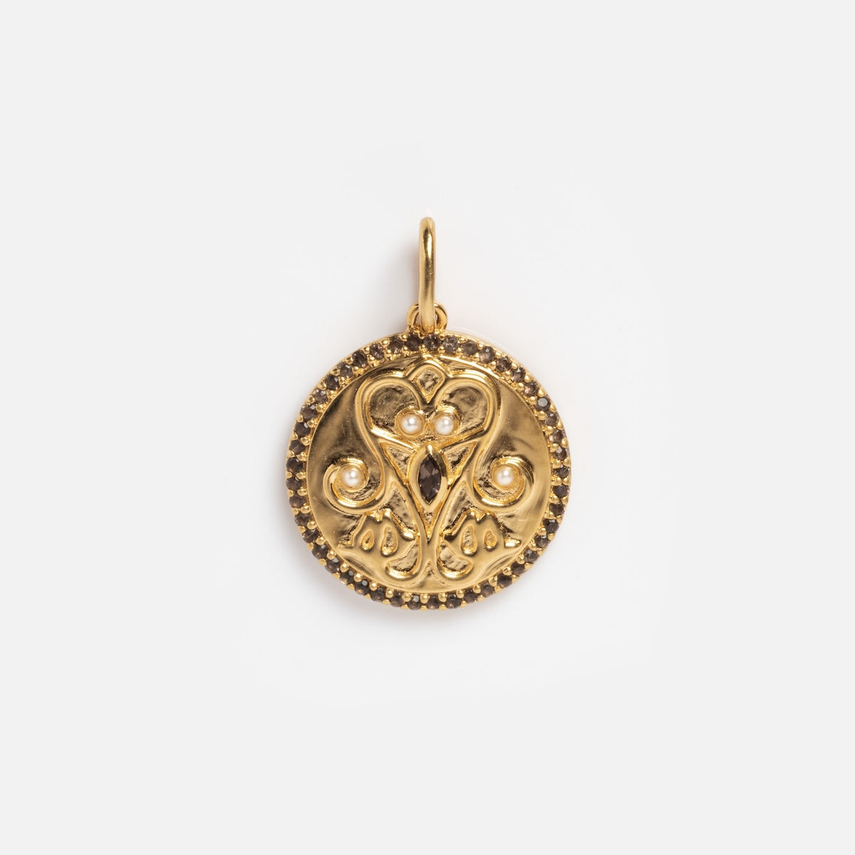 The Pearl Filigree Coin Charm Sample is a round gold pendant with ornate, symmetrical filigree, small raised beads, and a top loop for attaching to a necklace, featuring an elegant vintage-inspired design.