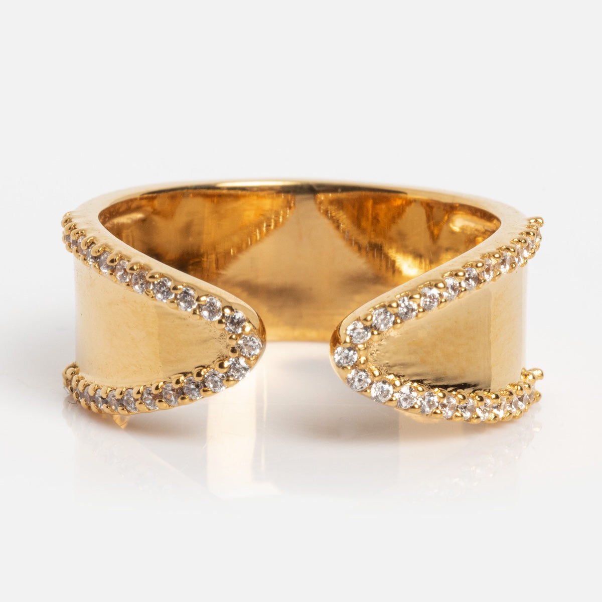 The Golden Pave Open Front Band Sample Size 7 features an open front with two angled ends outlined by sparkling white CZ gemstones, crafted on brass with a shiny 14k yellow gold plating, shown against a white background.