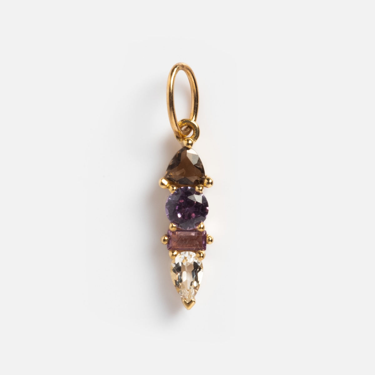 The Solid Gold Modern Ombre Birthstone Charm features four vertically stacked stones: a brown triangle, a round purple, a rectangular mauve, and a clear teardrop—a unique pendant with an ombre effect.