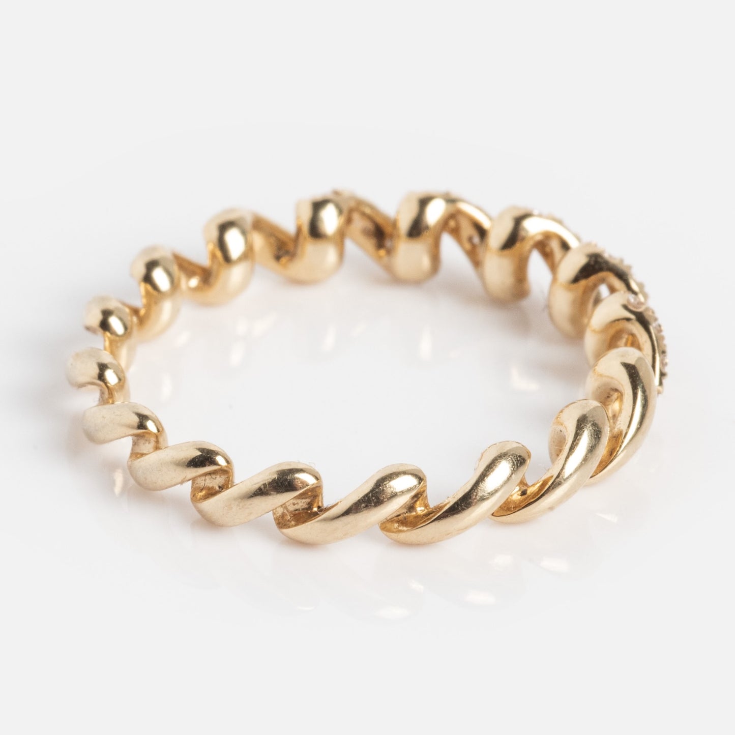 The 14k Fated Twist Diamond Ring features a twisted, rope-inspired design and is photographed on a plain white background.