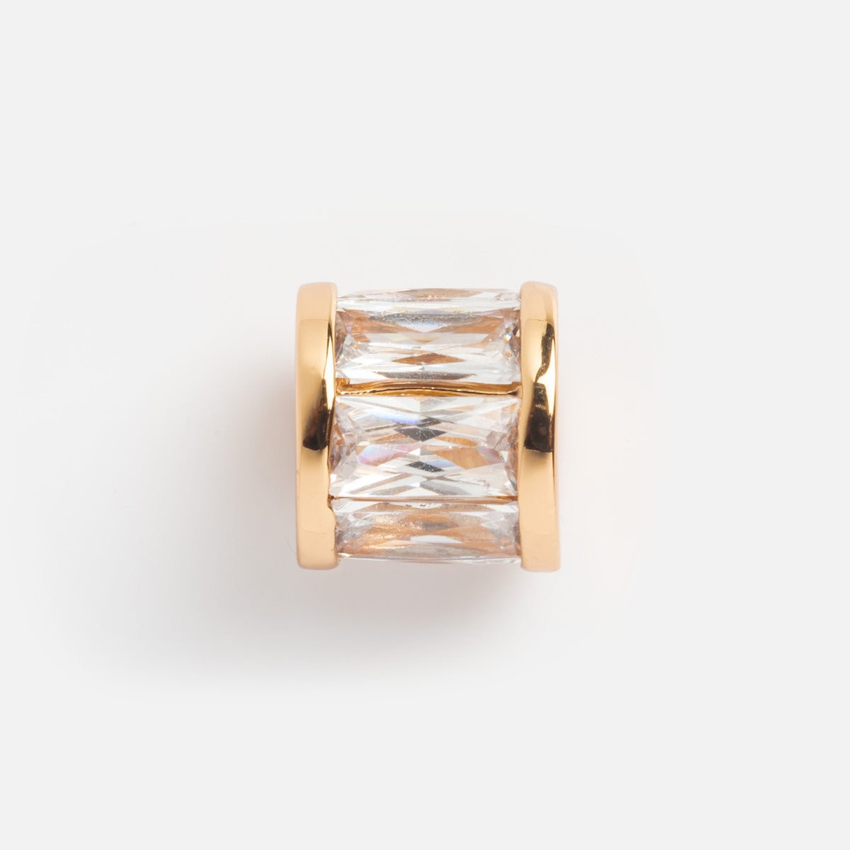The Charms by Thatch gold-finished ring or bead features two clear, rectangular faceted crystals side by side, ideal for pairing with gold plated charms, shown on a plain white background.