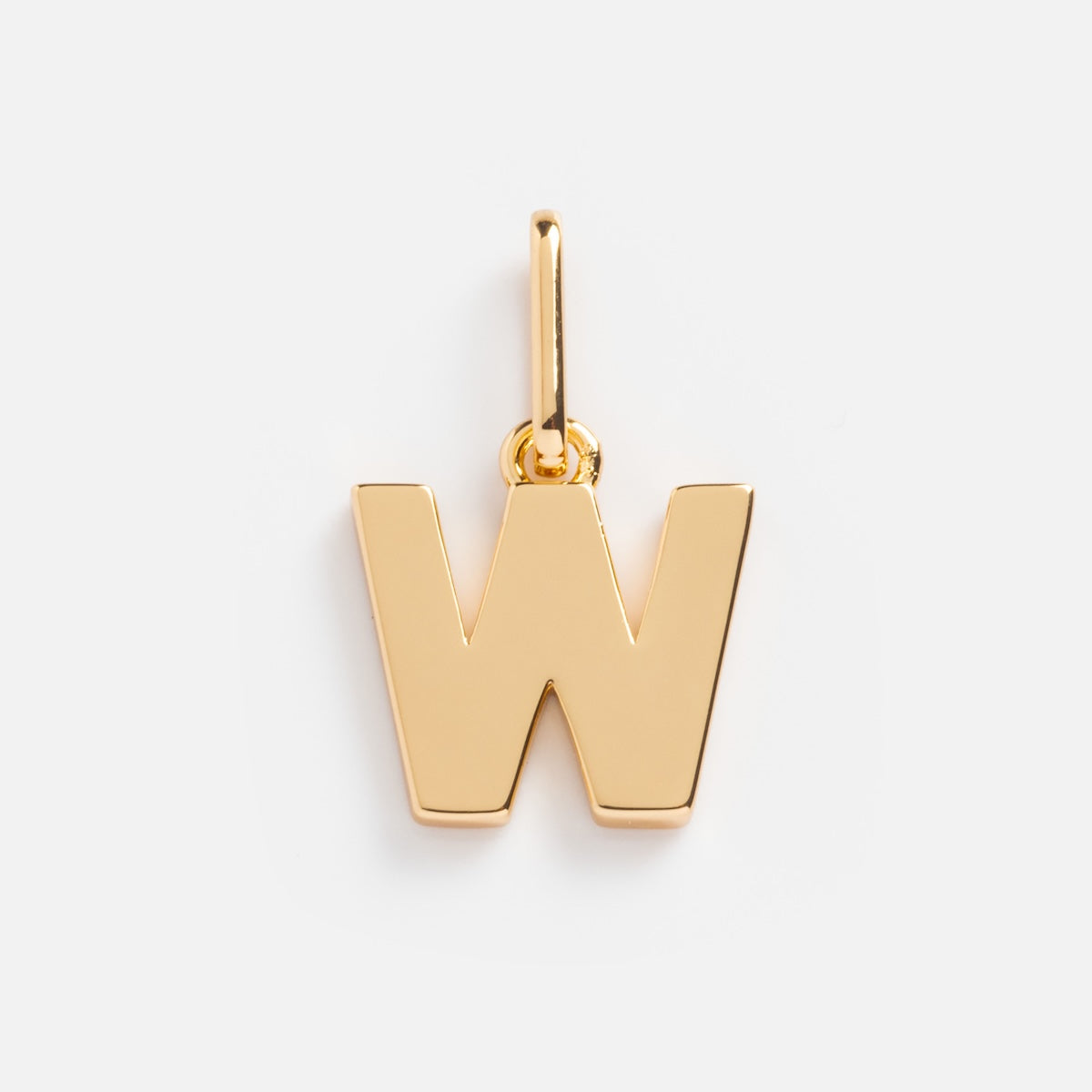 The Be You Initial Charm is a gold pendant shaped like the letter W with a small loop for attaching to your favorite necklace or bracelet, ideal for personalized jewelry and shown on a plain white background.