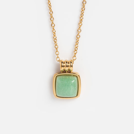 The Puzzle Square Aventurine Stone Necklace features a gold-plated square pendant with a green aventurine gemstone in a gold bezel, shown on a plain white background.