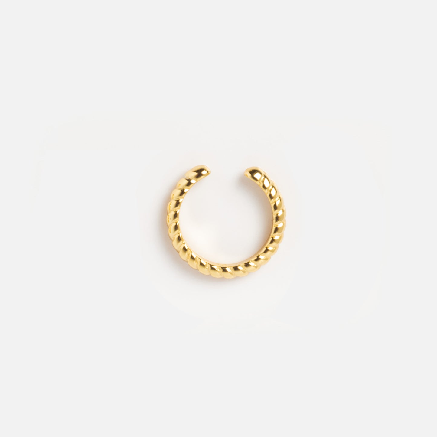 The Vienna Ear Cuff Sample is a small, open-ended ring in 18k yellow gold with a twisted rope design and an inner diameter of 10.5 mm, shown on a plain white background.