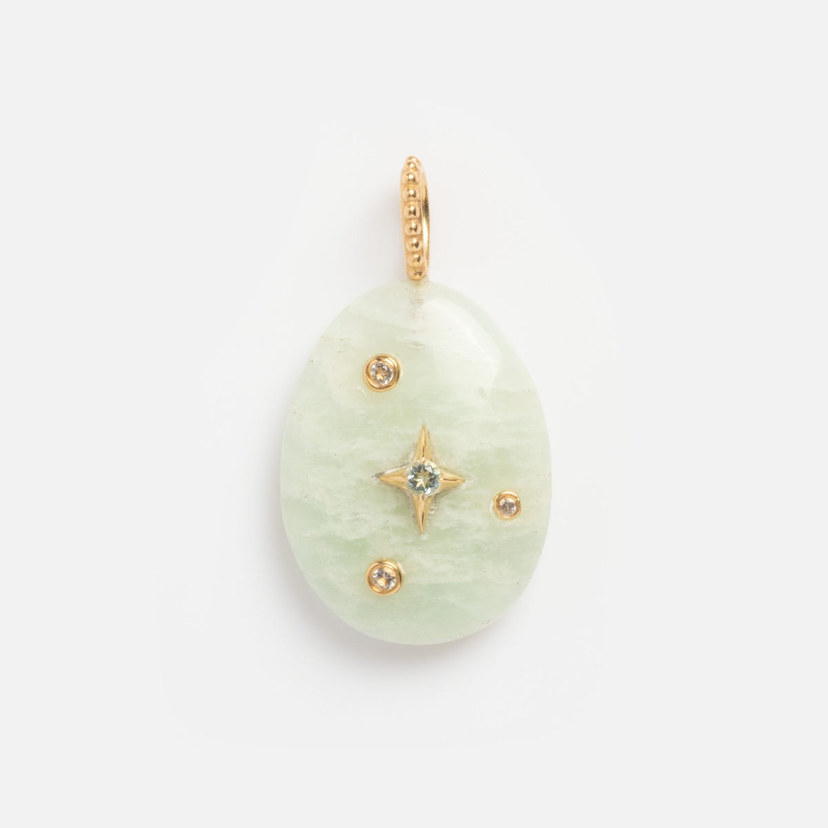 The Solid Gold Zodiac Constellation Crystal Charm features an oval pale green gemstone with gold detailing, a central star-shaped gold accent, and three round gold accents on a beaded loop—perfect as personalized zodiac jewelry.