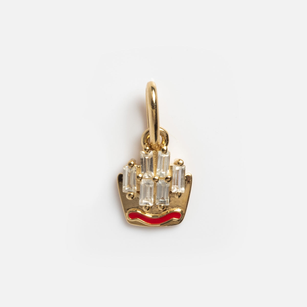 The Solid Gold Foodie Charm is a playful 9k yellow gold piece shaped like French fries, featuring baguette-cut clear stones as fries and a red enamel detail—a fun addition to any collection.