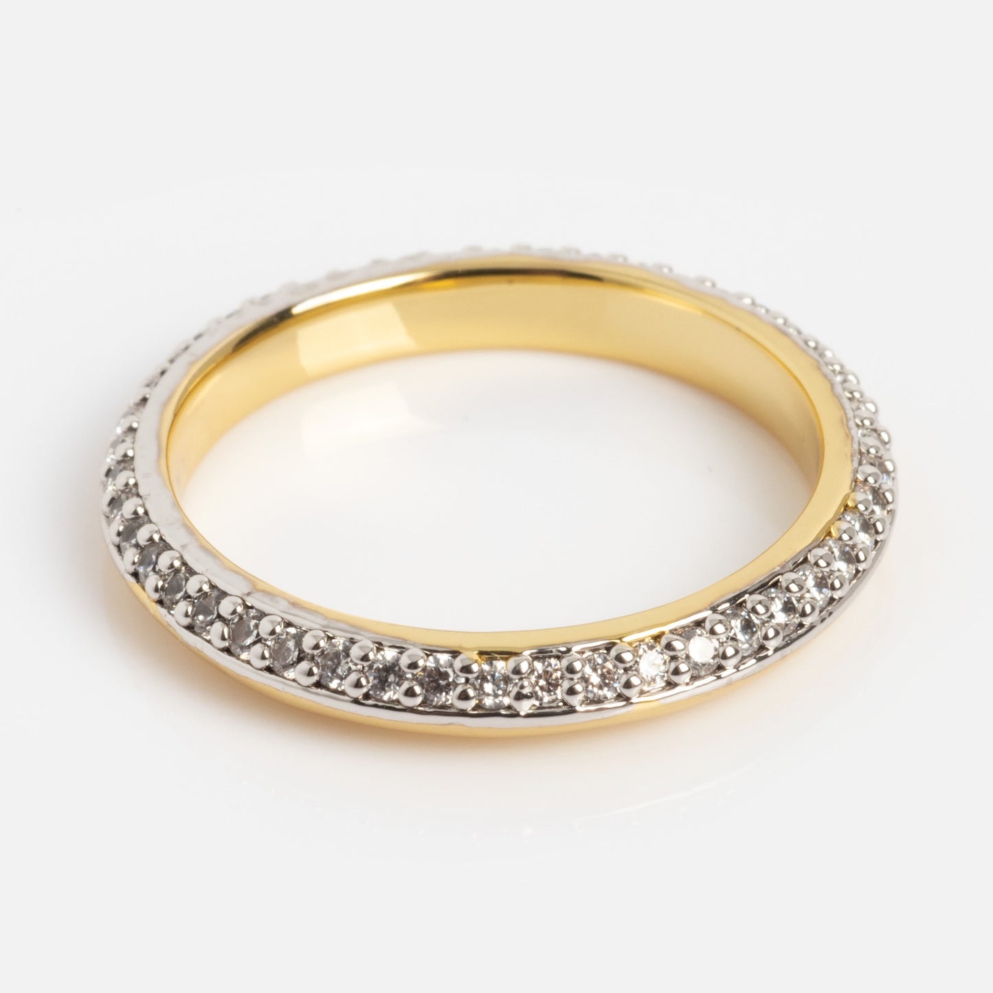 The Hidden Curse Word STFU Ring features a slim gold band adorned with sparkling diamonds all around, elegantly presented on a white background.