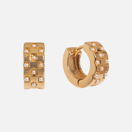 Checkered Pearl Huggies: 18k gold plated earrings with simulated pearls in a chic checkered pattern, shown on a plain white background.