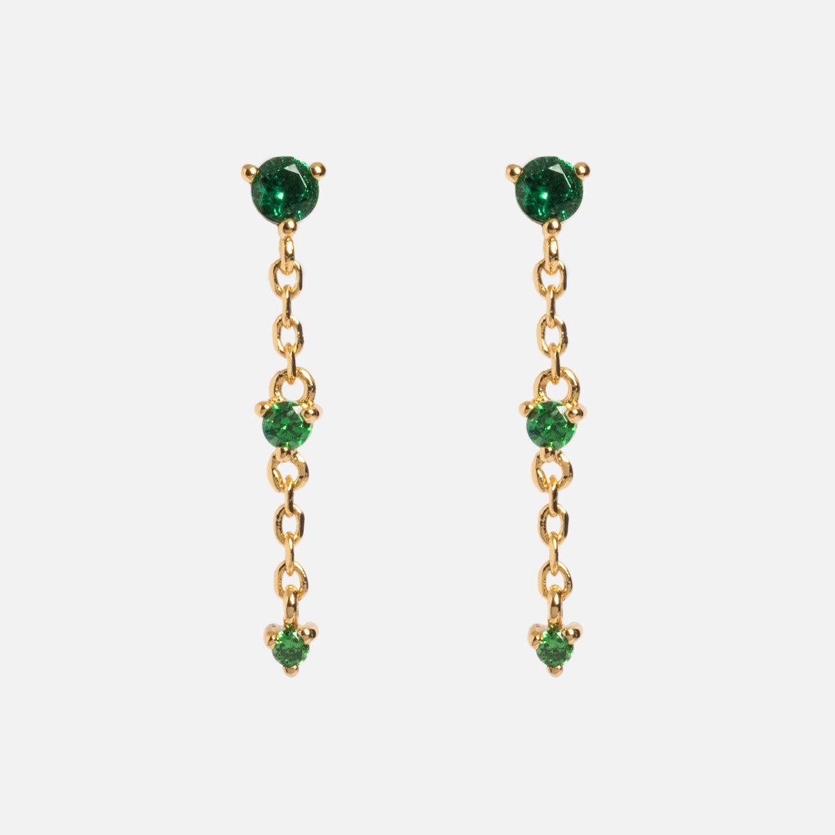 Celebration Ombre Birthstone Drop Studs feature three linked green gemstones on each gold plated dangle earring, set in a minimalist 14k gold design and shown on a white background.