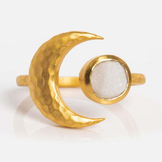 The Moon Open Ring is an 18k gold plated crescent ring with a hammered moon design and a round faceted white stone, shown on a plain white background.
