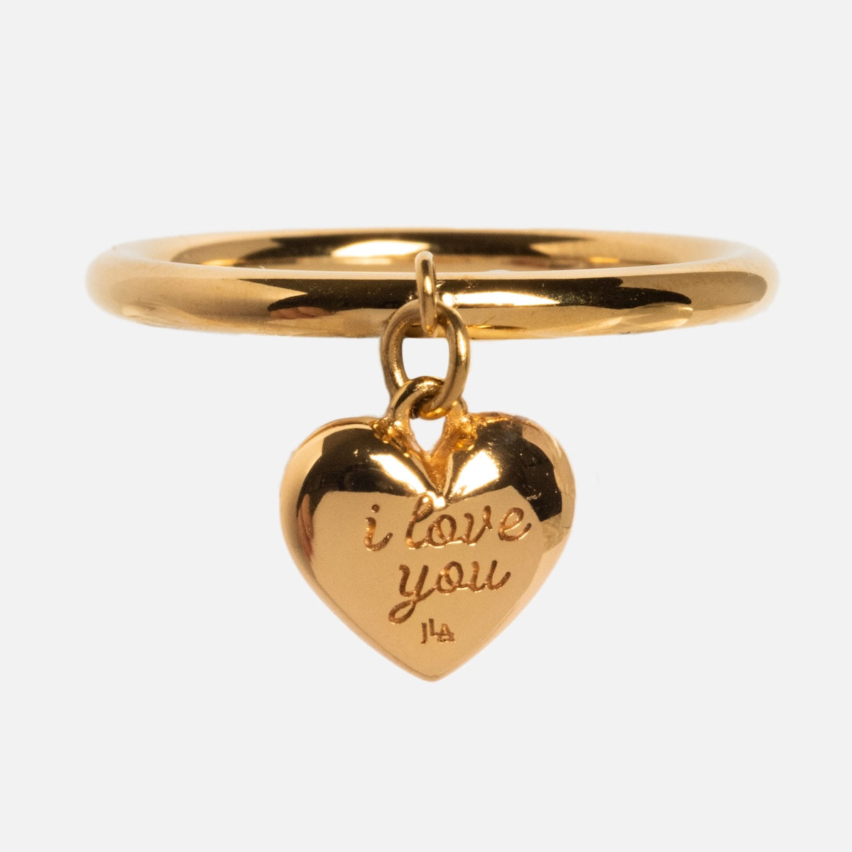 The Sweet Heart Ring features a heart-shaped charm engraved with i love you, hanging from an 18k gold plated band, shown on a plain white background.