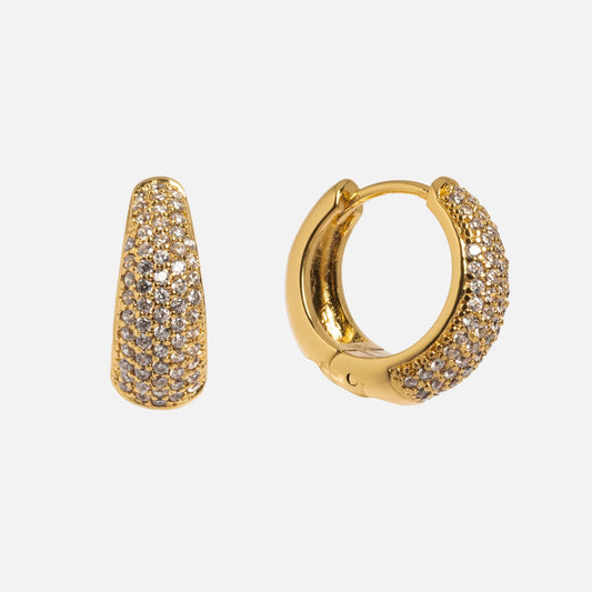 The Chantel Earrings are 14k gold-plated pavé hoops encrusted with sparkling crystals, shown on a plain white background with one earring facing forward and the other in a side view.