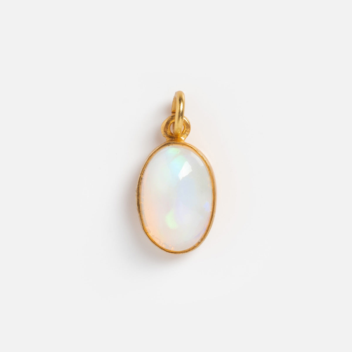 Anokhi Greens Gemstone Charms features an oval opal pendant set in 18k gold vermeil, shown against a plain white background.