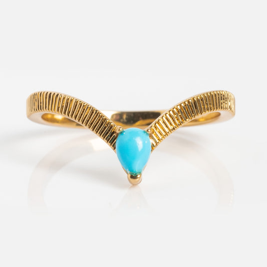 The Gem Drop Textured Stacking Ring features a V-shaped gold band with a teardrop turquoise center—ideal as a unique teardrop turquoise ring or as a stylish stacking piece.