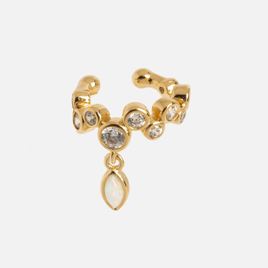 The Sparkle Drop Ear Cuff features a gold finish with round clear gemstones and a dangling marquise-shaped opal charm, offering elegant, no-piercing-required style. Shown on a white background.