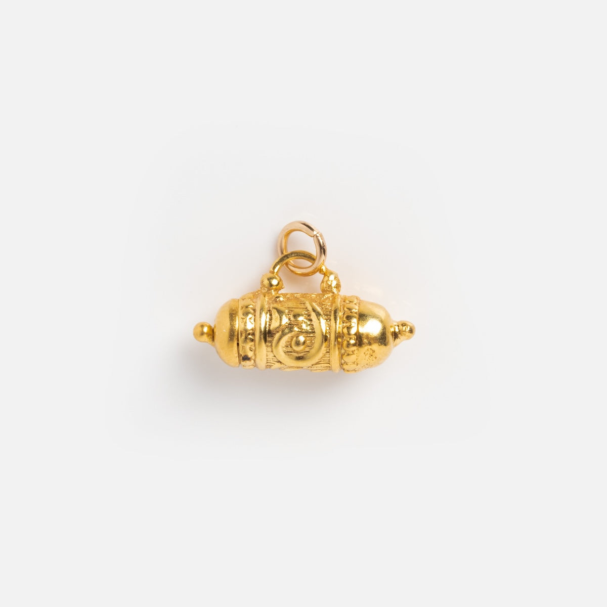 Tum charm on white background