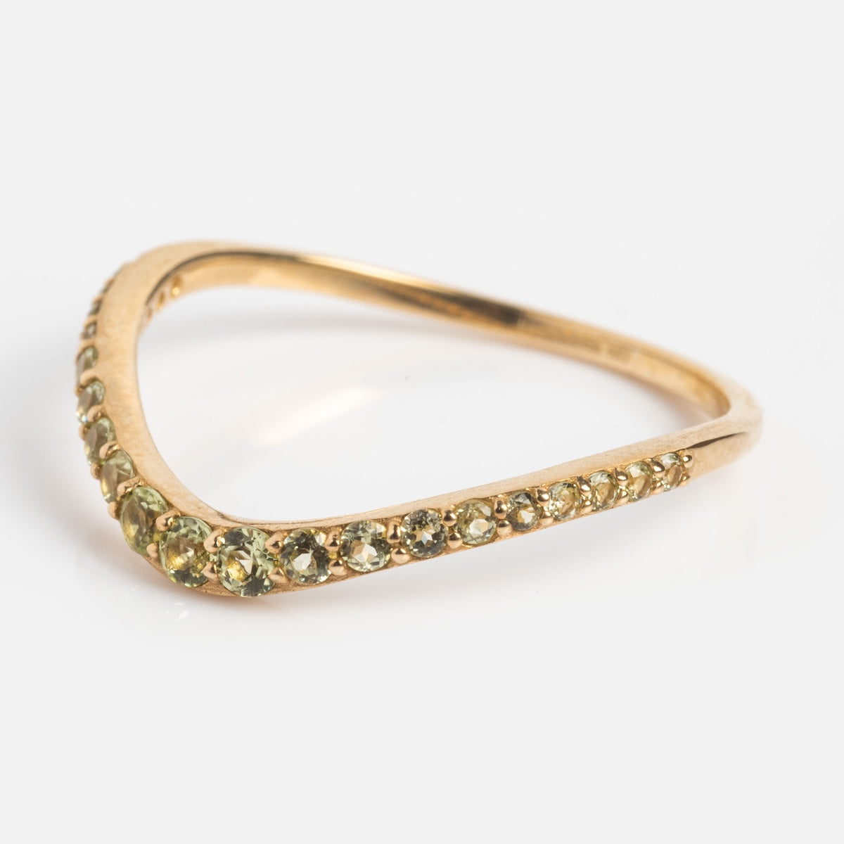 Side view of peridot stacking ring