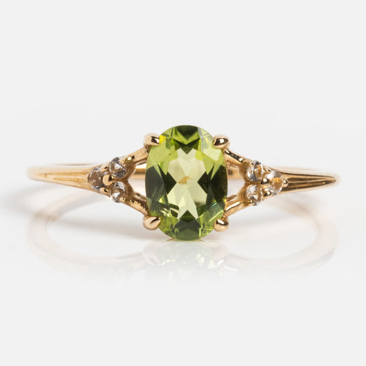 Statement peridot gold ring on white
