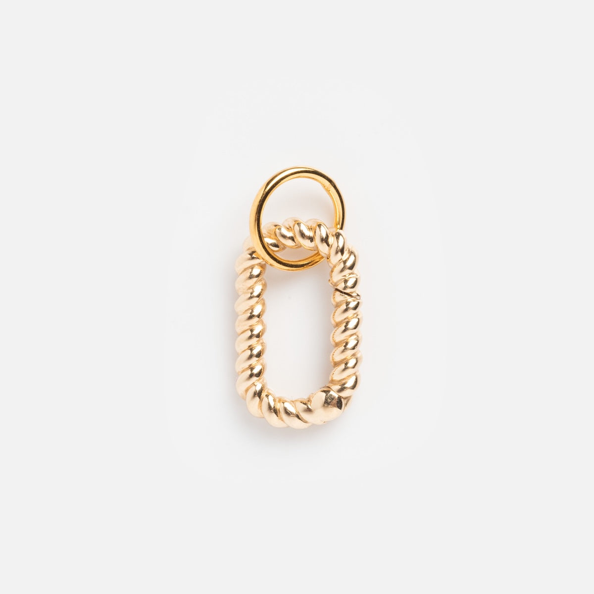 The Charm Clip is a single 14k gold vermeil earring featuring a twisted, rope-like rectangular shape with a small round hoop at the top, shown on a plain white background. Available exclusively at Local Eclectic.