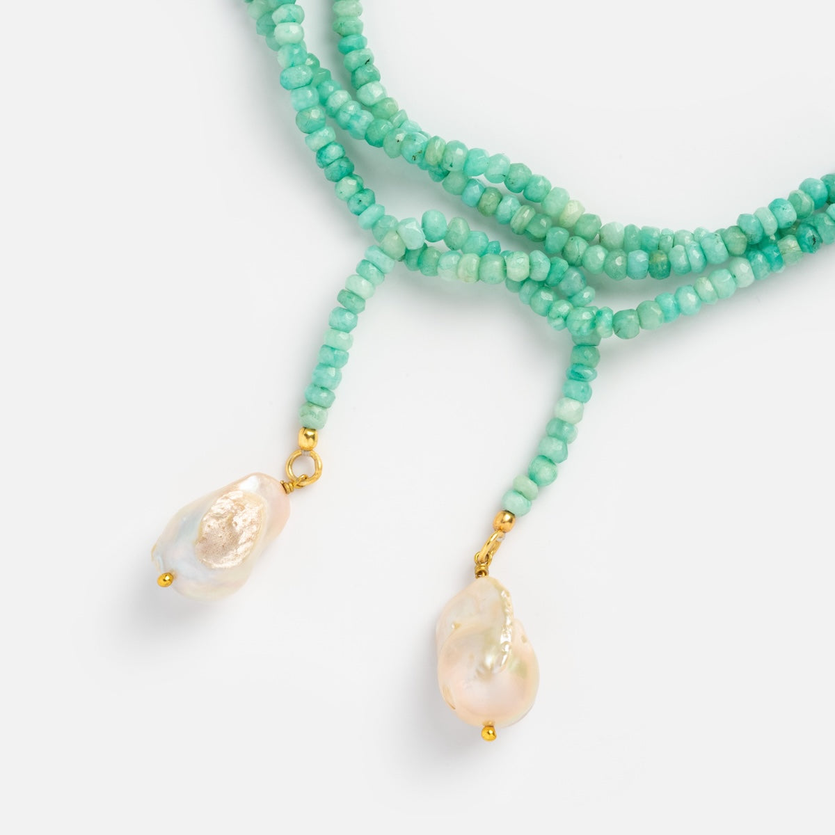 Close up of beaded amazonite tie necklace with pearls