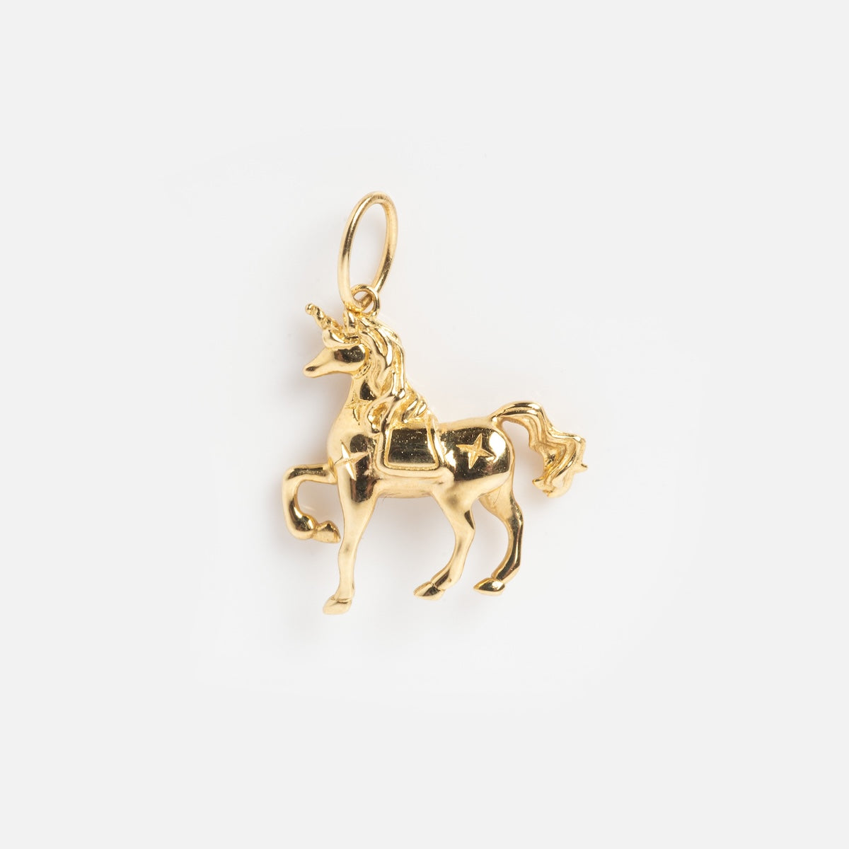 The Solid Gold Lucky Charm is a unicorn-shaped pendant with a top loop for easy attachment to a necklace or bracelet, displayed on a plain white background.
