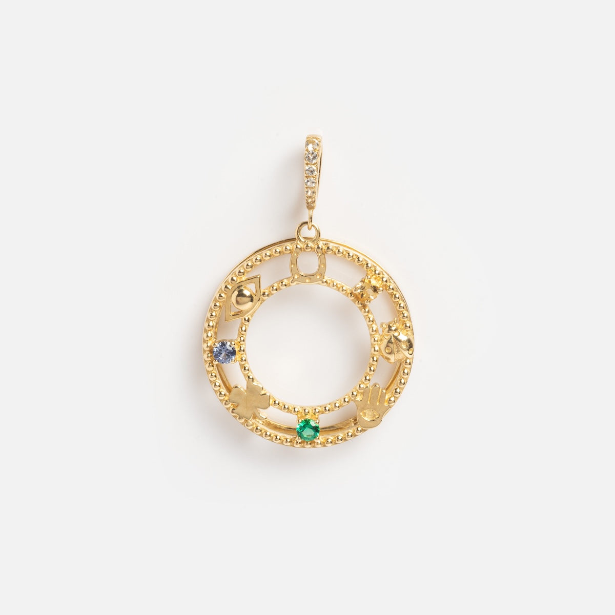 The Solid Gold Lucky Charm is a circular pendant with small gemstones and zodiac symbols around the ring, plus a diamond-studded bail on top, displayed against a plain white background.