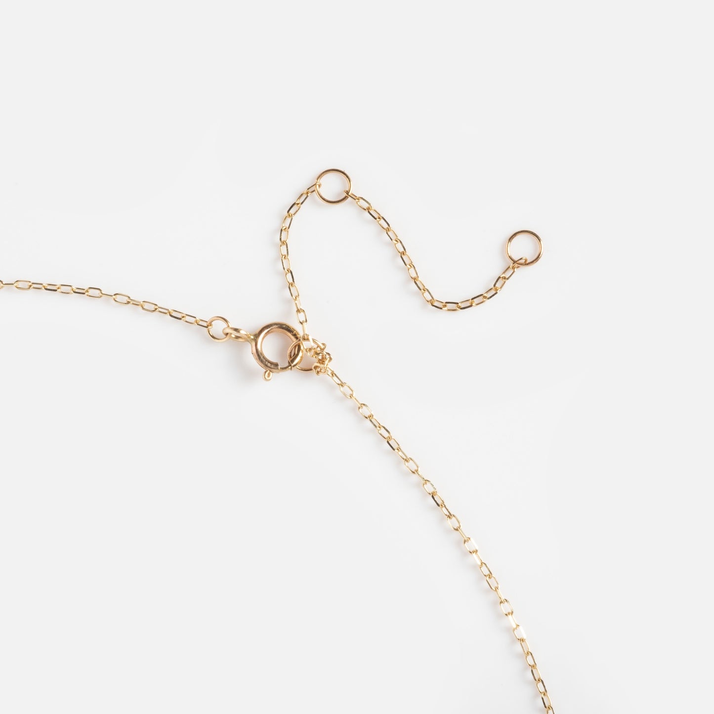 The Solid Gold 2025 October Capsule Vintage Inspired Opal Pendant Necklace features a delicate gold chain with a spring ring clasp and three circular extender loops, displayed on a plain white background.