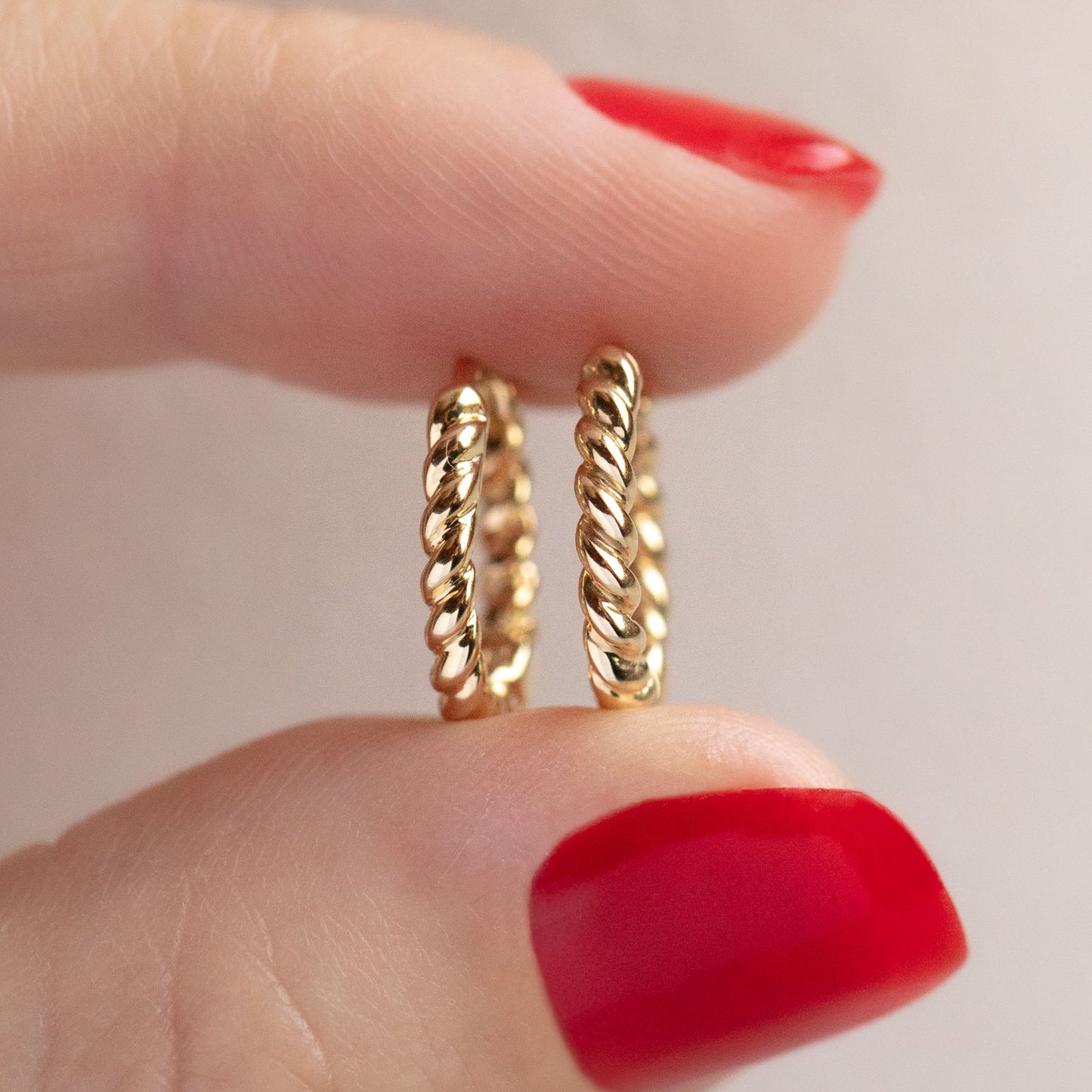 Solid Gold Twisted Huggie Hoops