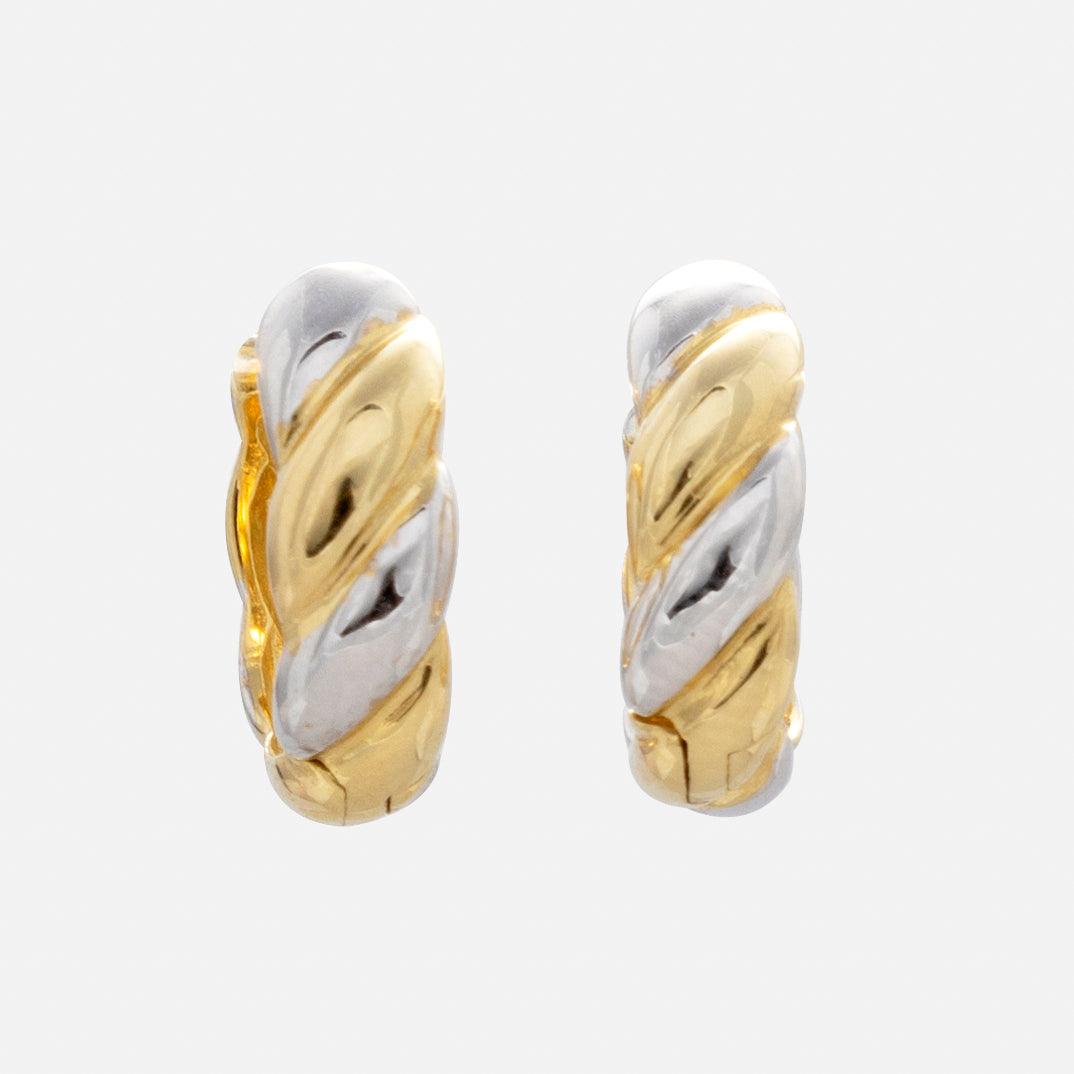 The Solid Gold Mixed Metal Twisted Huggie Hoops feature a small twisted design with alternating gold and silver tones, shown on a plain white background—an ideal pair of everyday mixed metal earrings.