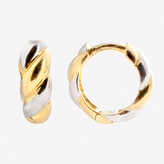 The Solid Gold Mixed Metal Twisted Huggie Hoops showcase a twisted design with alternating gold and silver tones, displayed side-by-side on a white background.