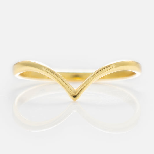 The Arch Ring is a minimalist 18k yellow gold plated stacking ring featuring a V-shaped curve at the front, shown against a plain white background.