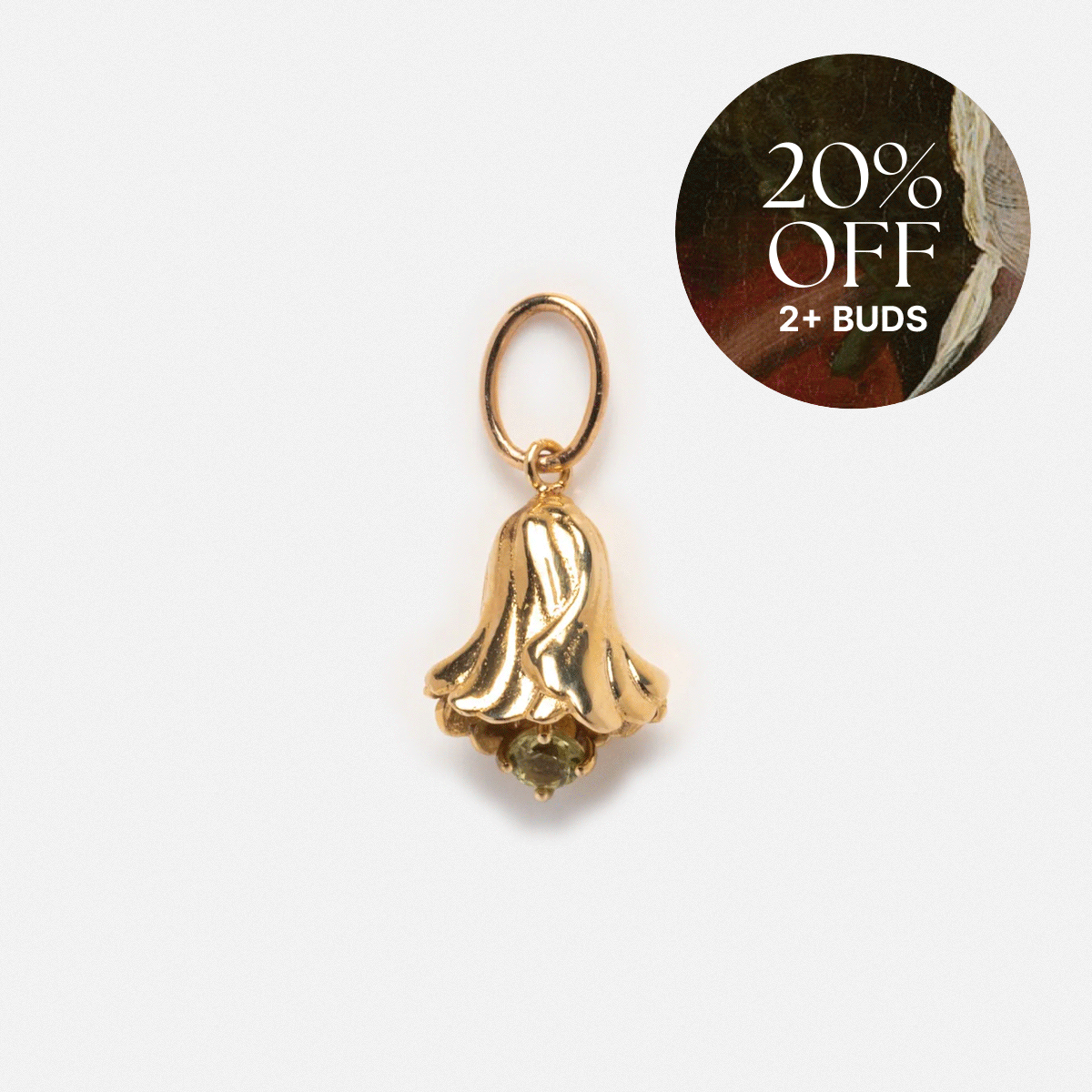 A Solid Gold Birth Flower Bud Charm with a small loop, displayed on a plain background. A circular label in the corner reads “20% OFF 2+ BUDS,” with part of a classical painting visible in the background.