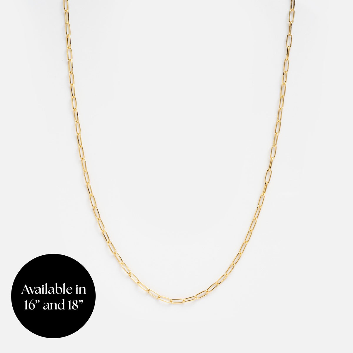 The Chain For Charms, a gold vermeil paperclip chain necklace with elongated oval links, is shown on a white background. A black circle at the lower left states: Available in 16” and 18”.