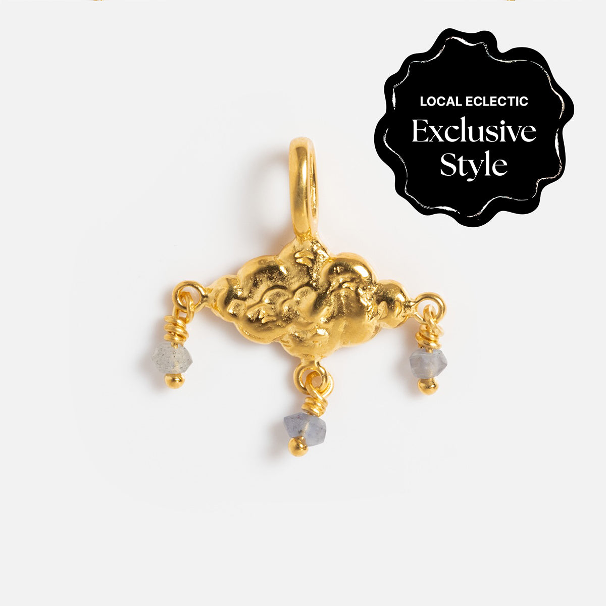 A gold vermeil cloud-shaped pendant with three dangling gray gemstone charms from Charms by Hunt of Hounds, displayed on a white background. A corner label reads “Local Eclectic Exclusive Style.”.