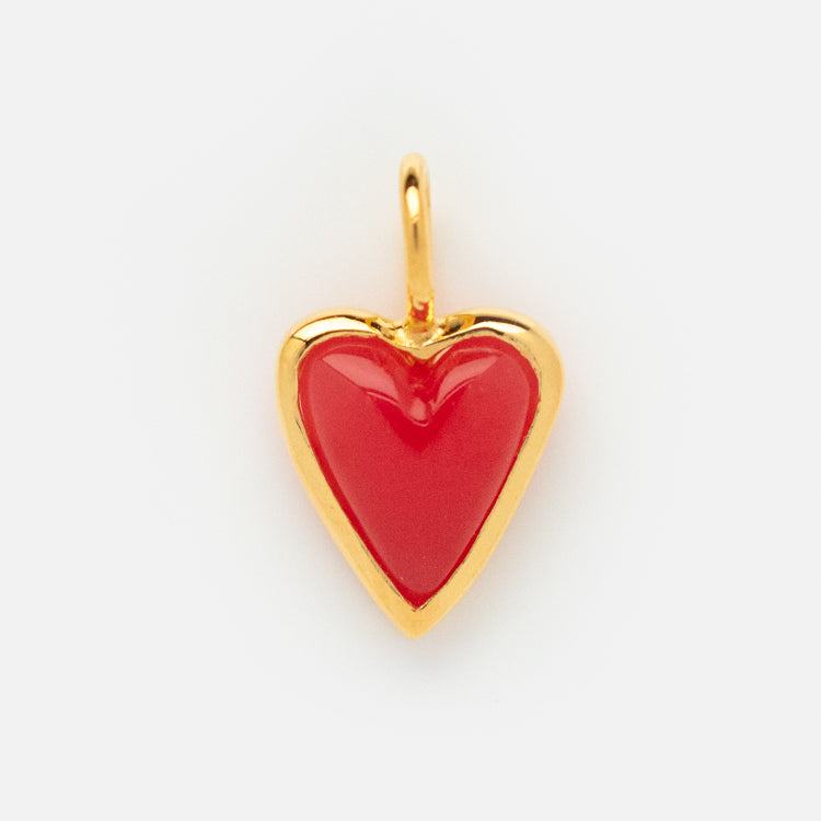 The Charms by Hunt of Hounds features a gold vermeil heart-shaped pendant with a glossy red center, displayed on a plain white background—an elegant charm to enhance your collection.