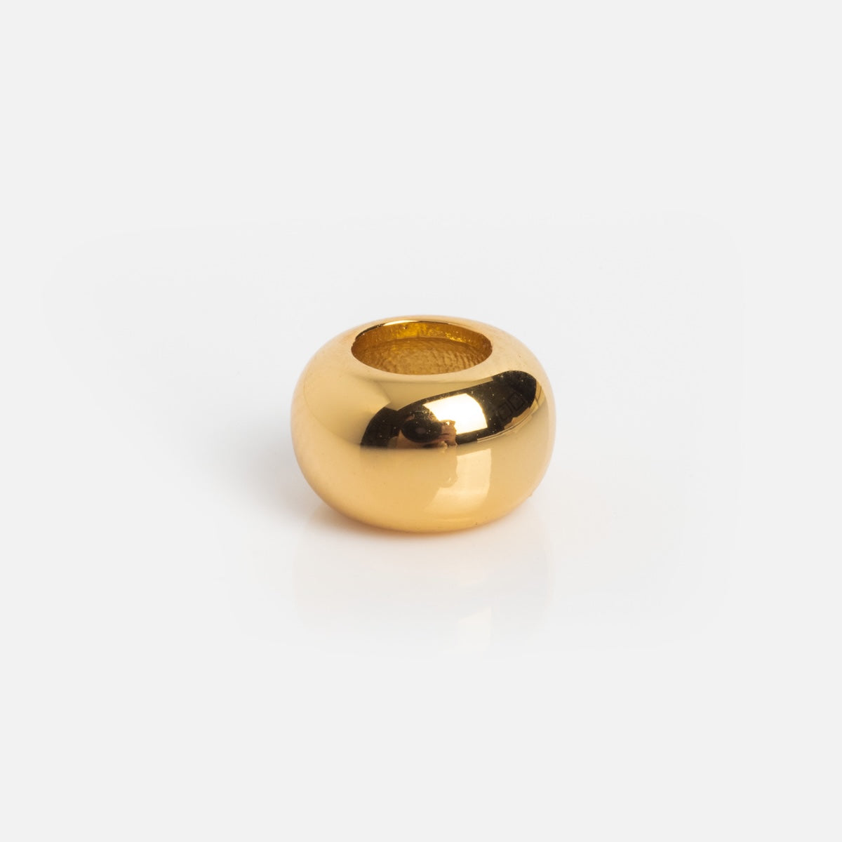 The Charms by Thatch gold-plated, round charm bead features a shiny finish, large central hole, and is showcased on a white background.