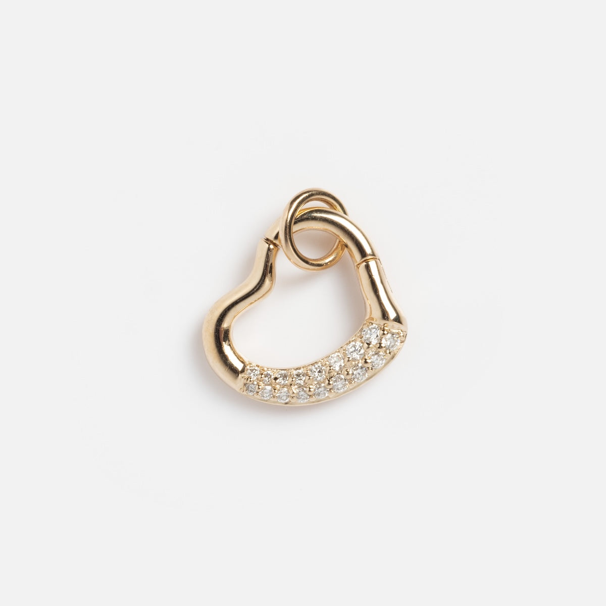 The Solid Gold Charm Clip features a curved, asymmetrical design partially encrusted with sparkling diamonds and makes a stunning bracelet attachment, shown against a plain white background.