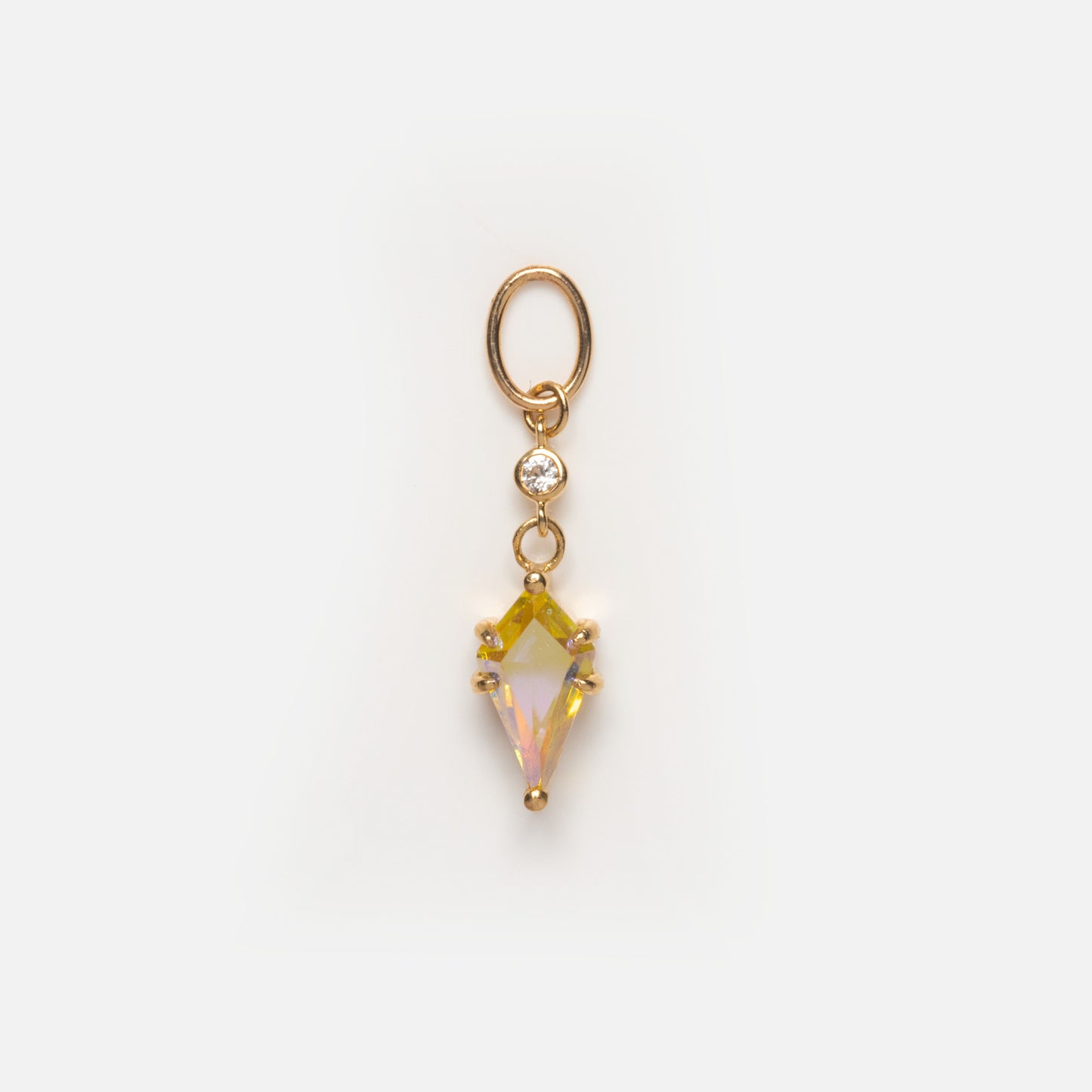 Exclusive to Local Eclectic, the Solid Gold Amulet Charm necklace showcases a round clear gemstone above a larger geometric iridescent stone, all set in gold with an oval loop and presented on a white background.