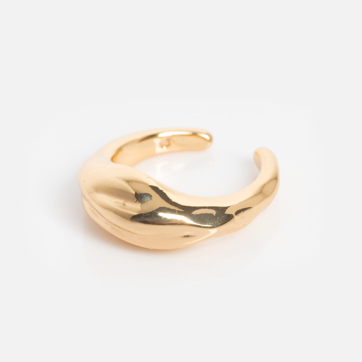 A shiny, gold, open-band ring with a wavy, organic design—echoing the style of the Liquid Luxe Ear Cuff—photographed on a plain white background.