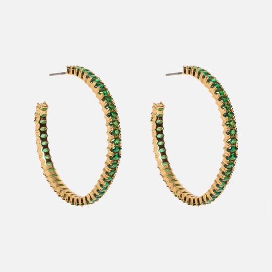 The Emerald Marquise Hoops are gold-plated earrings featuring a row of small emerald green gemstones, shown against a plain white background.