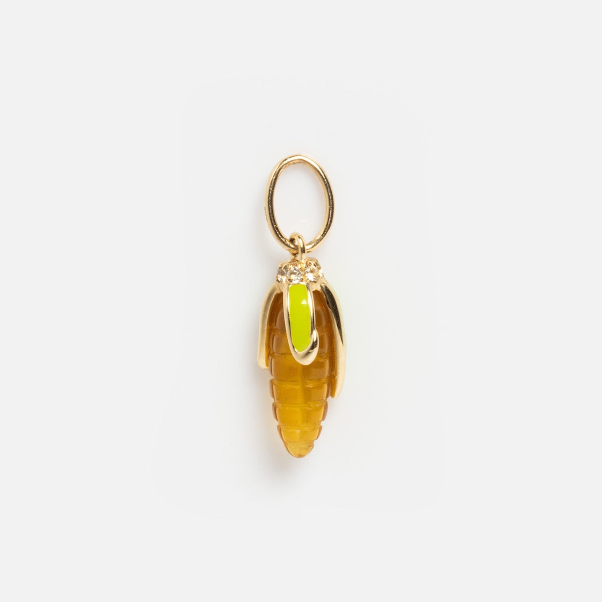 The Solid Gold Foodie Charm is a 9k yellow gold pendant shaped like a peeled banana with yellow enamel, featuring a small loop for attaching to a necklace or bracelet, shown on a plain white background.