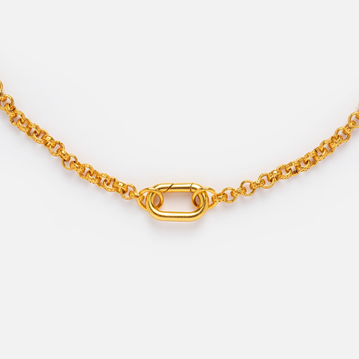 A close-up of the Gold Filled Charm Holder Necklace by Local Eclectic, featuring a prominent central oval link on an 18k yellow gold filled chain, displayed against a plain white background.